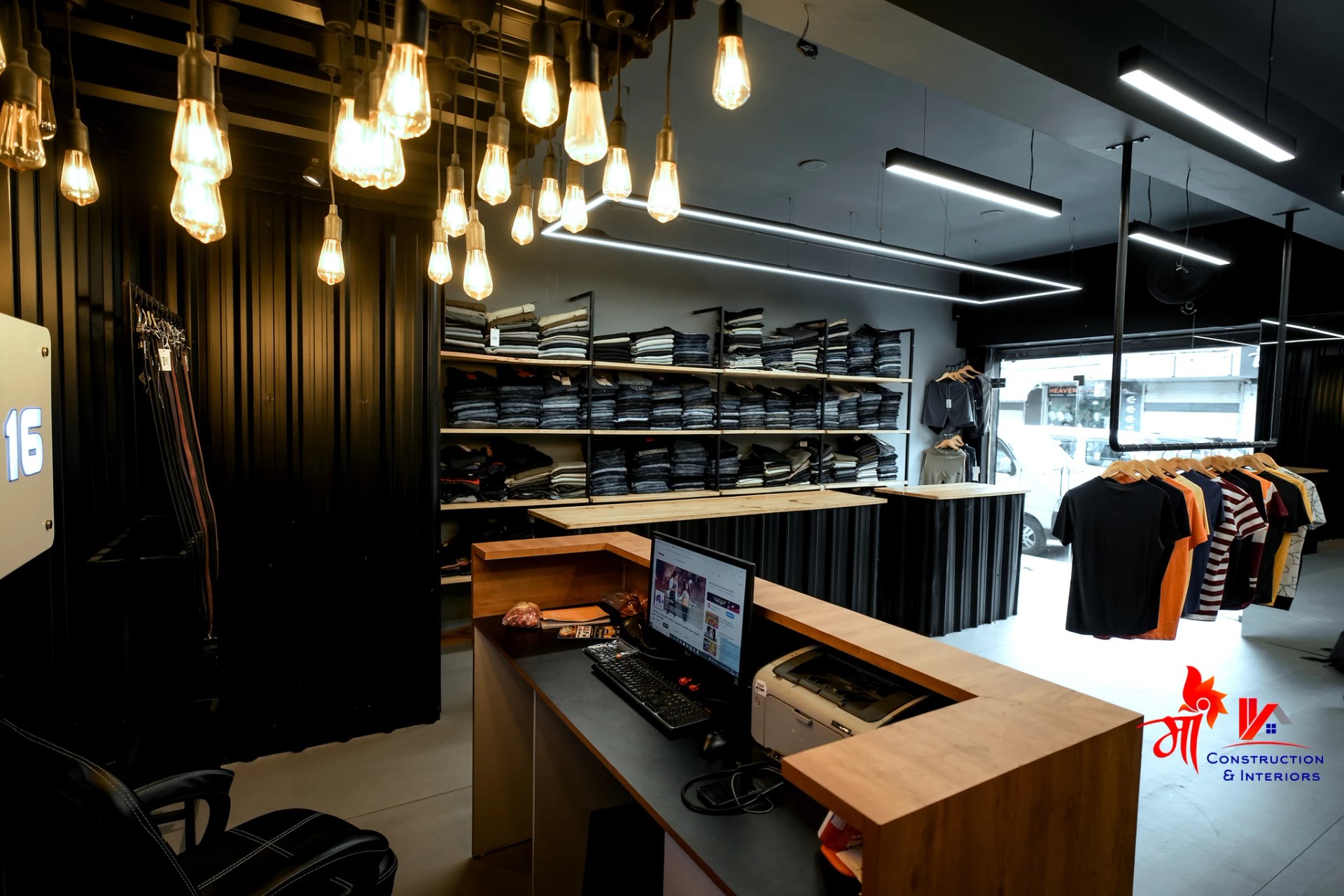 Boutique rail display inside black steel grid — 5